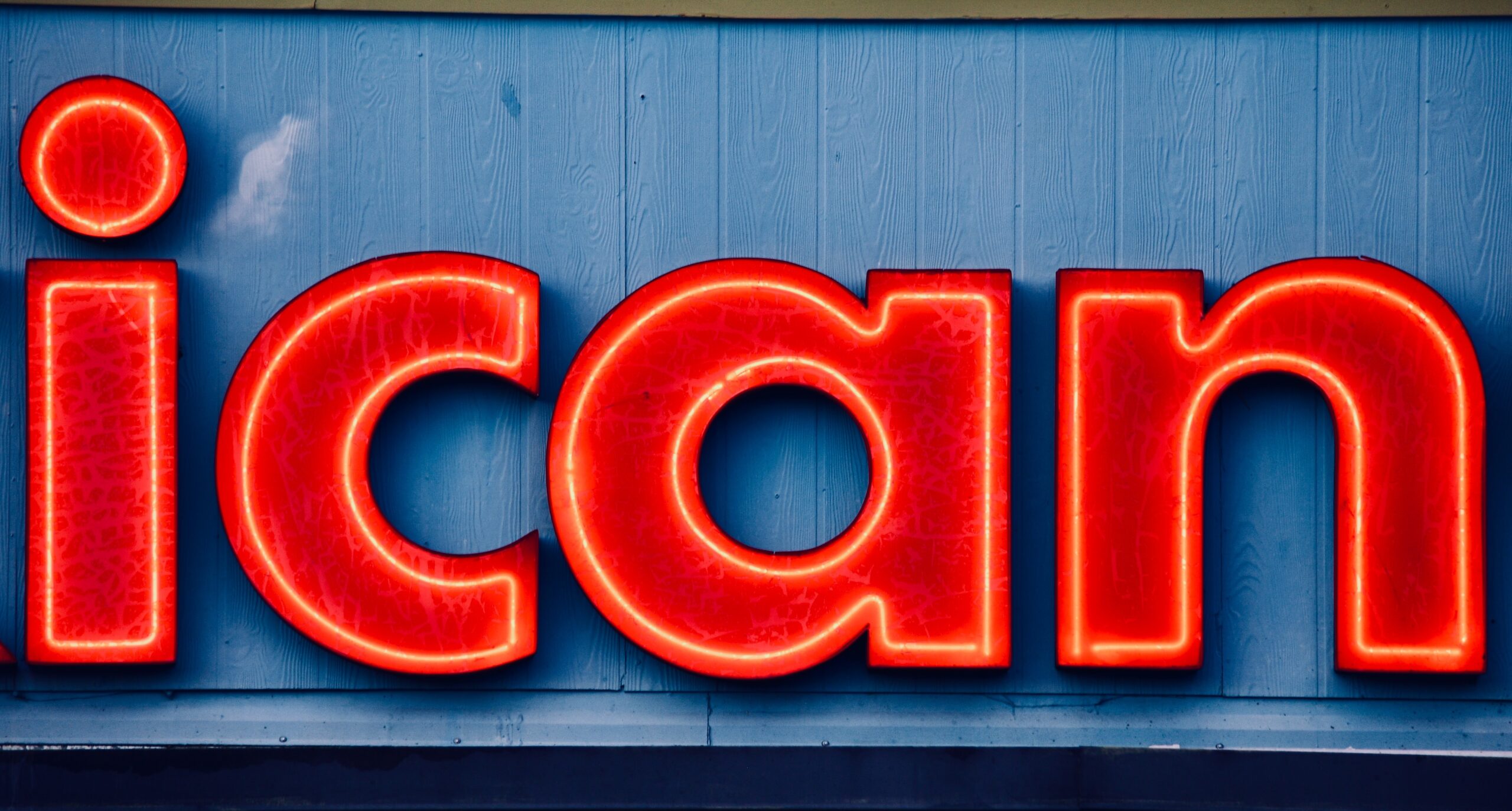 The words 'I Can' depicted as a neon sign